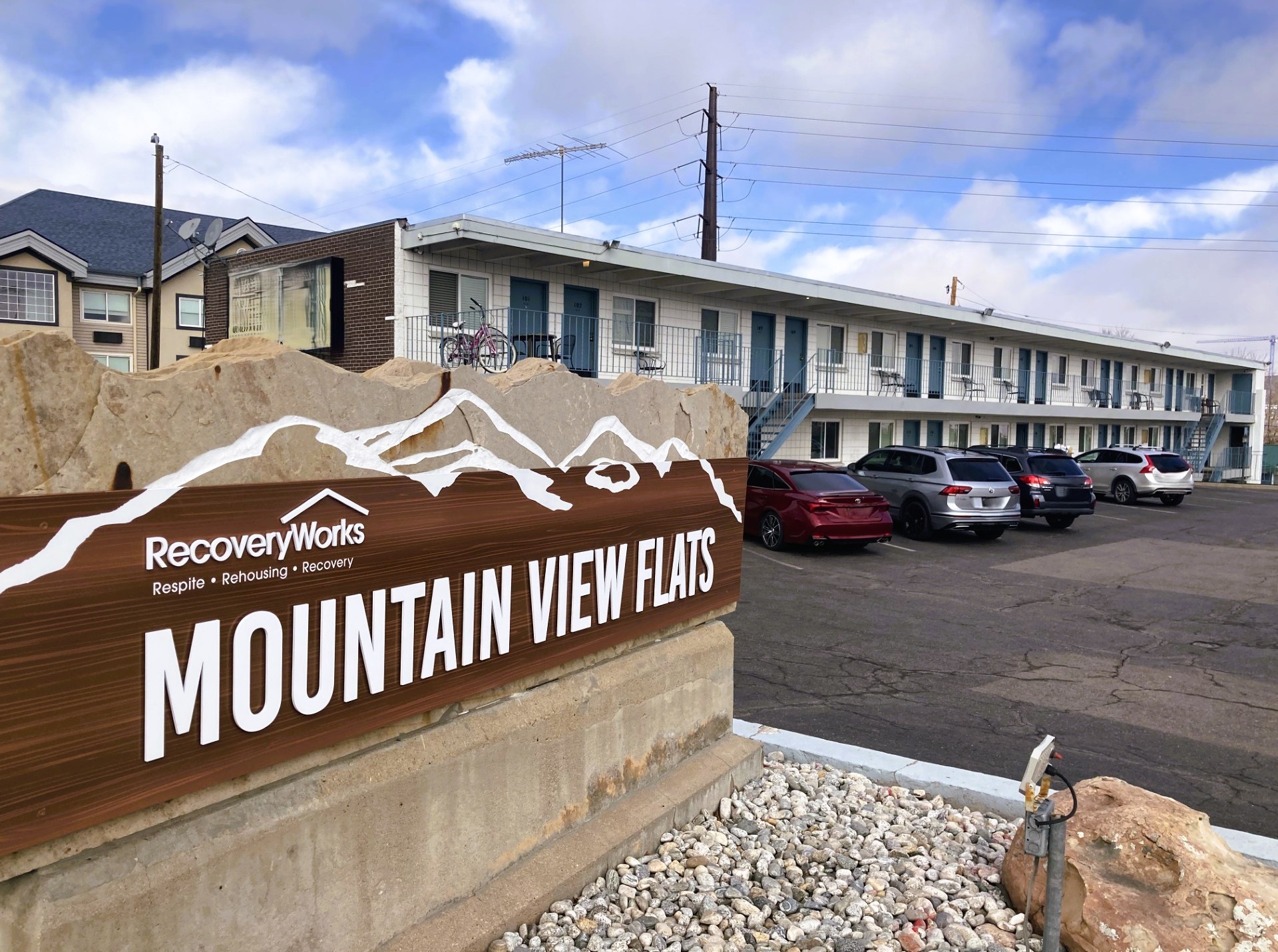 Mountain View Flats exterior wood sign