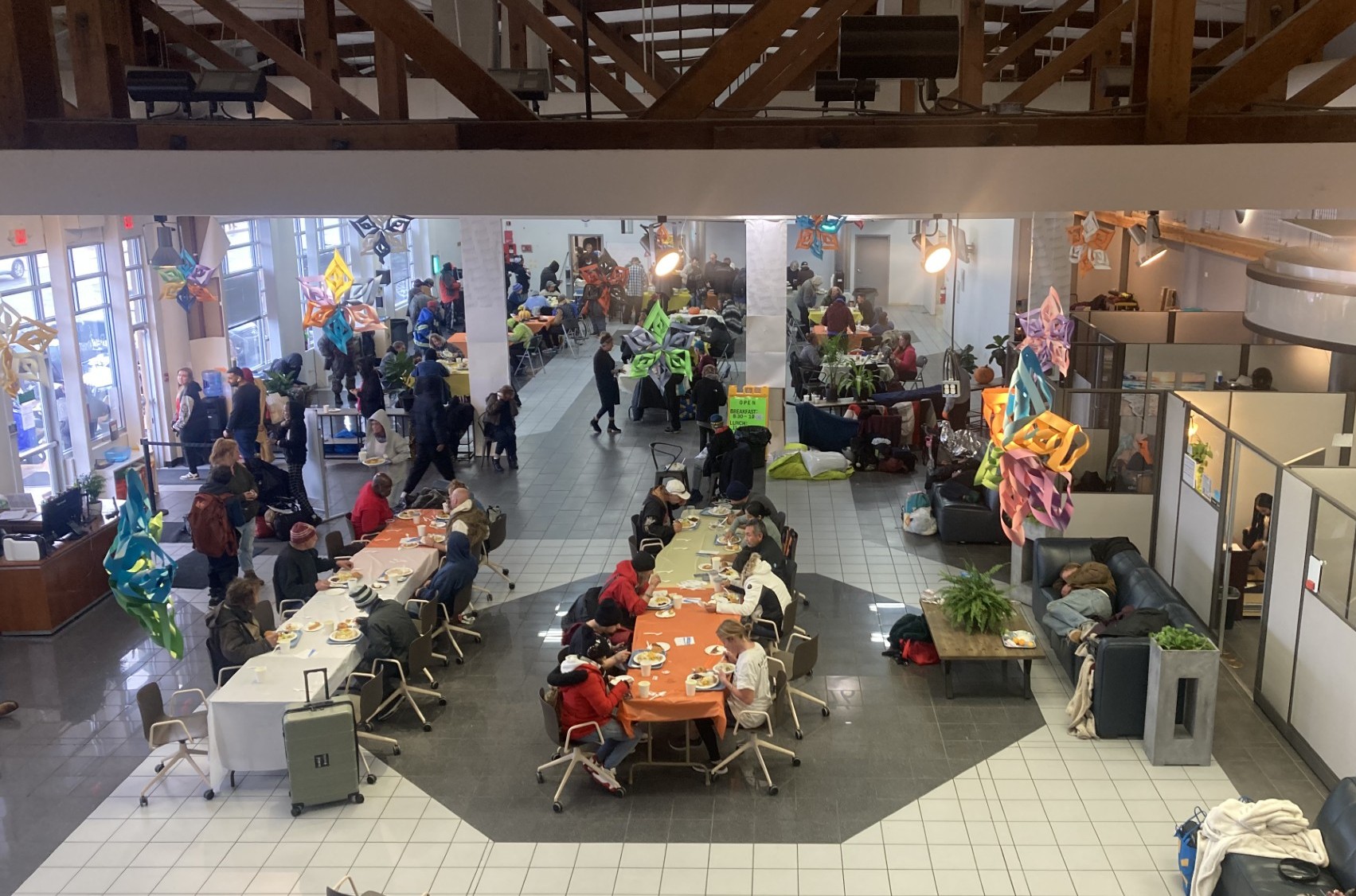 Navigation Center large group eating at tables