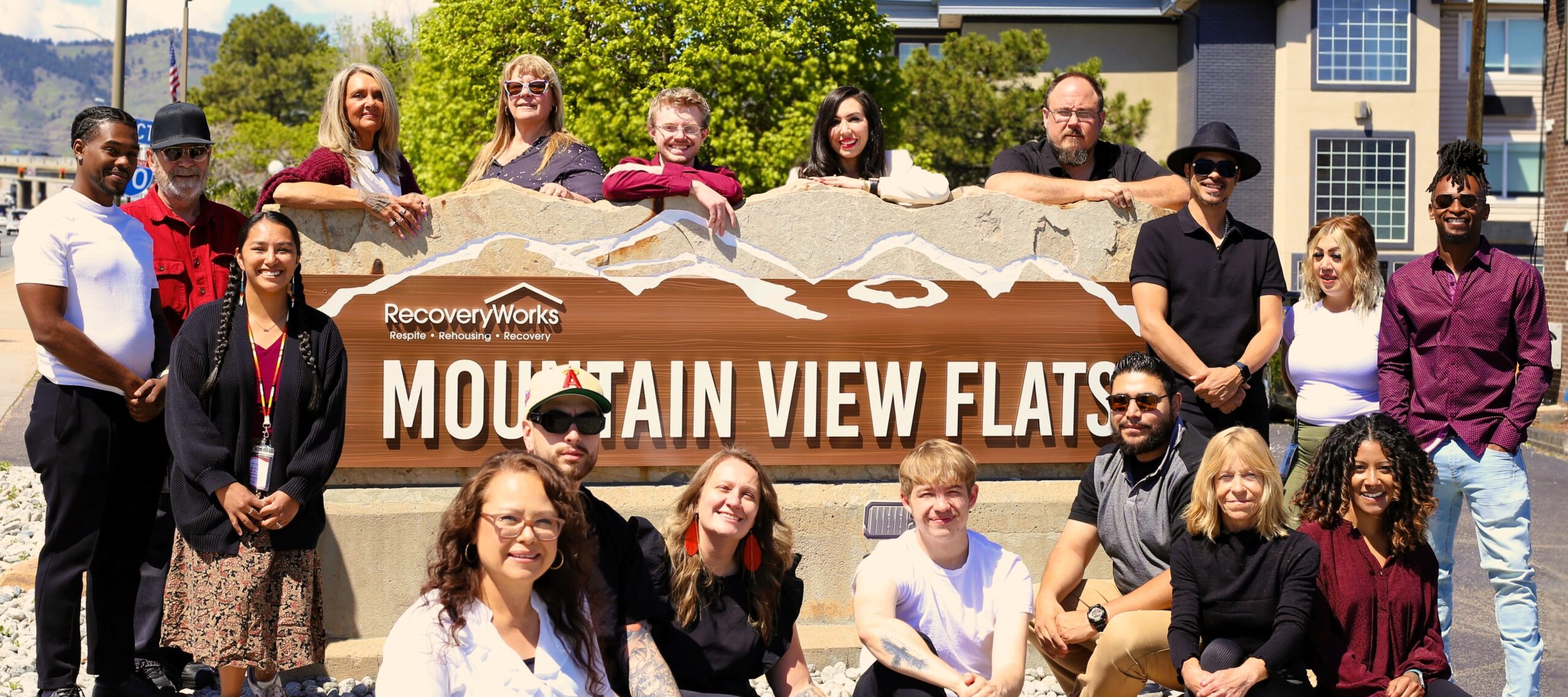 Staff photo RecoveryWorks in front of sign